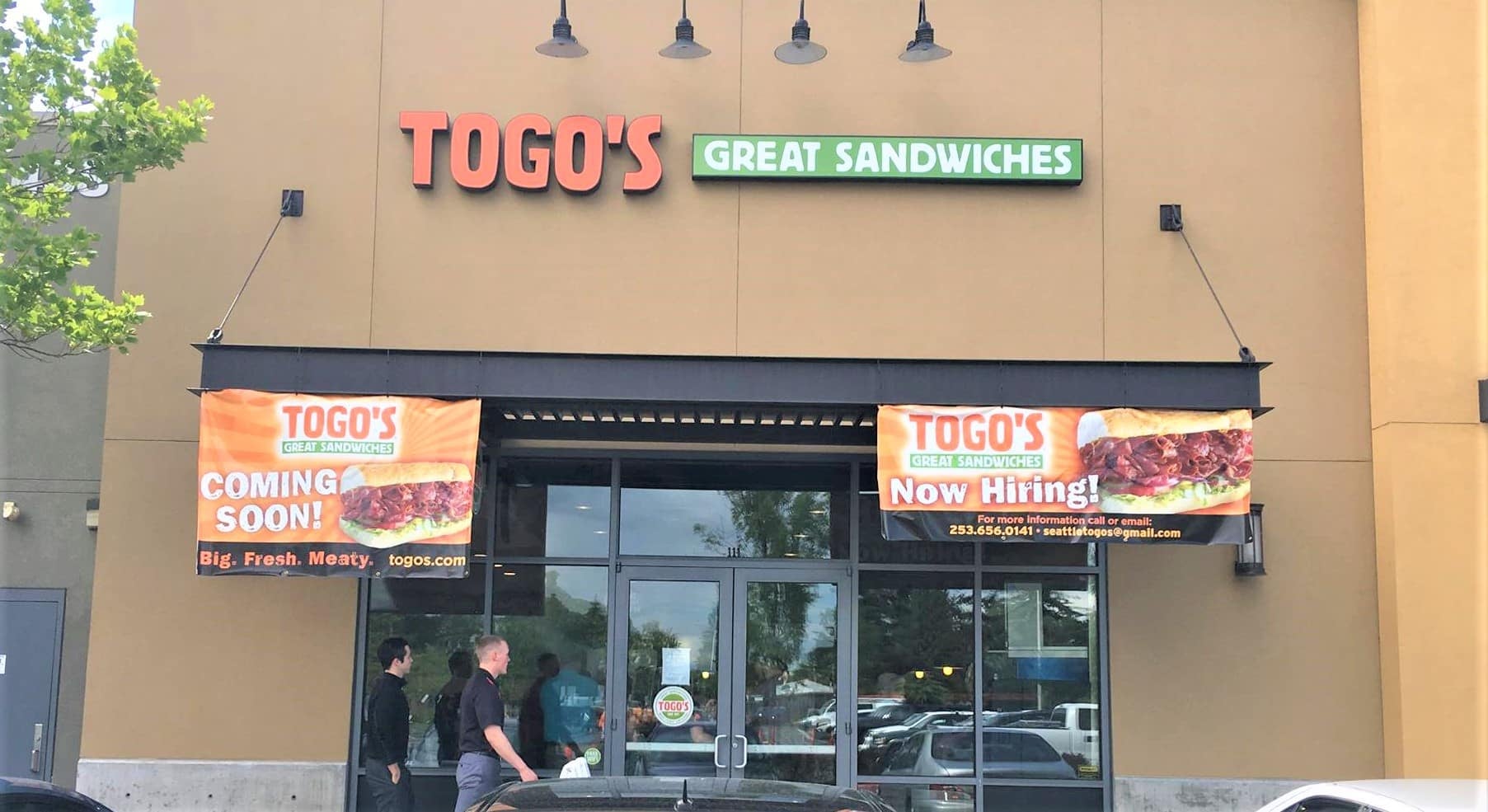 Custom storefront channel letters and banners by Milwaukee Sign Company