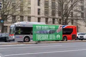 bus wrapped in a promotional vinyl graphics.